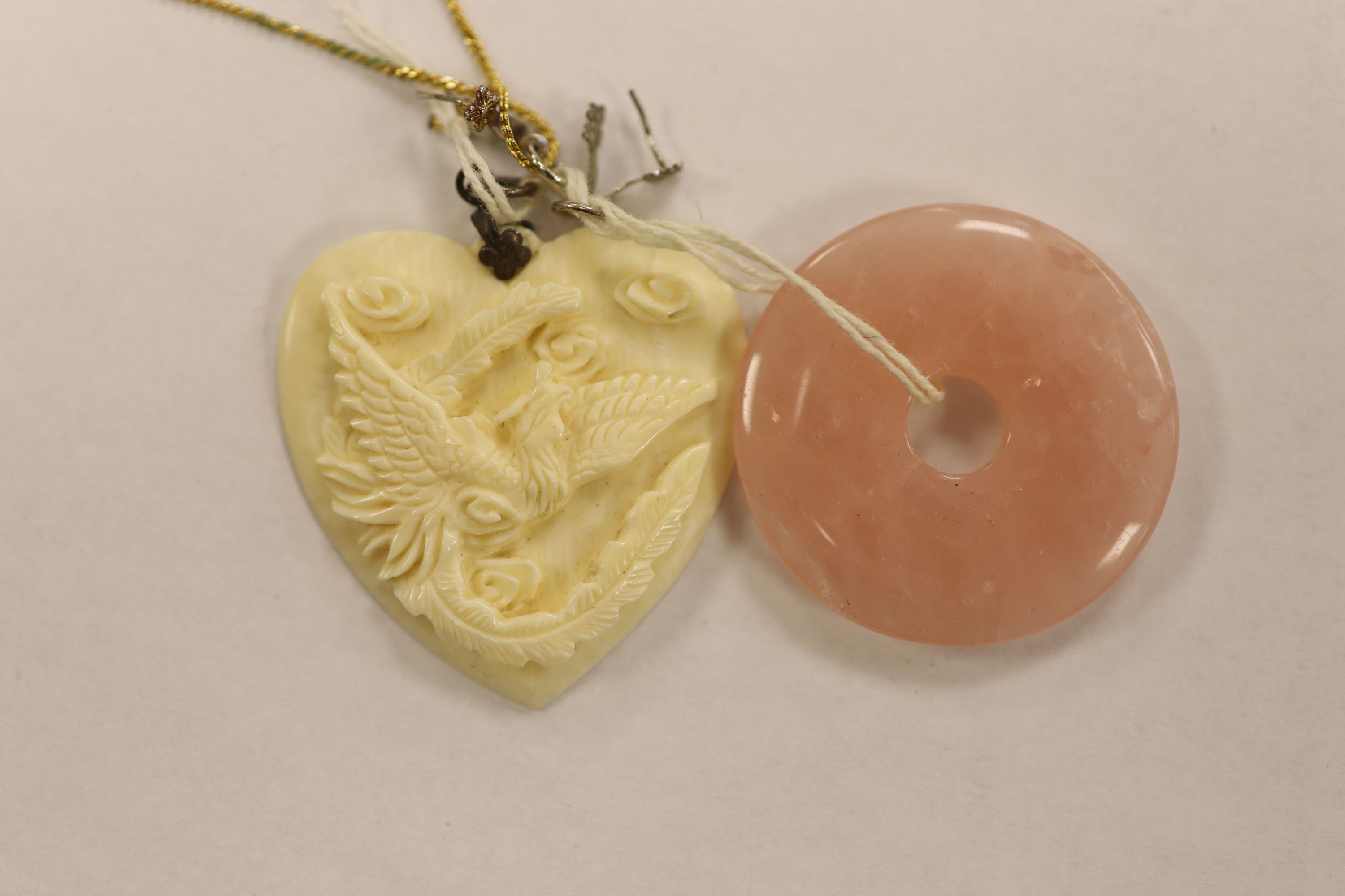 A quantity of assorted jade bi discs and other hardstones